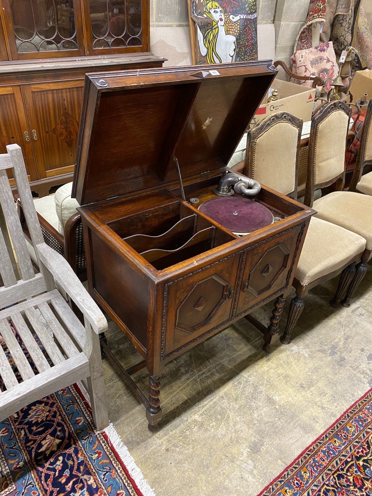 An early 20th century Apollo oak cased cabinet gramophone, width 74cm, depth 50cm, height 84cm